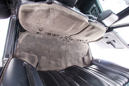 Black leather rear seats of retro car