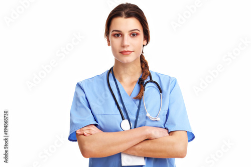 Woman doctor isolated over white background © Kalim