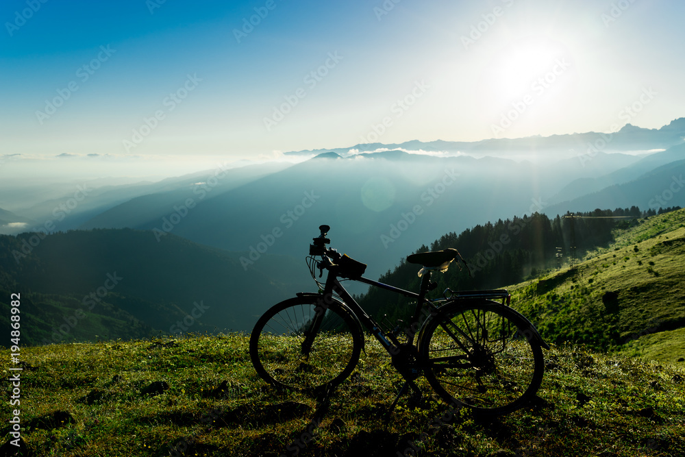 Bike in Bicycle Camp Against Sunset Sky Background Bike in Bicycle Camp Against Sunset Sky Background