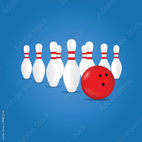 bowling ball in red color and skittle on blue background
