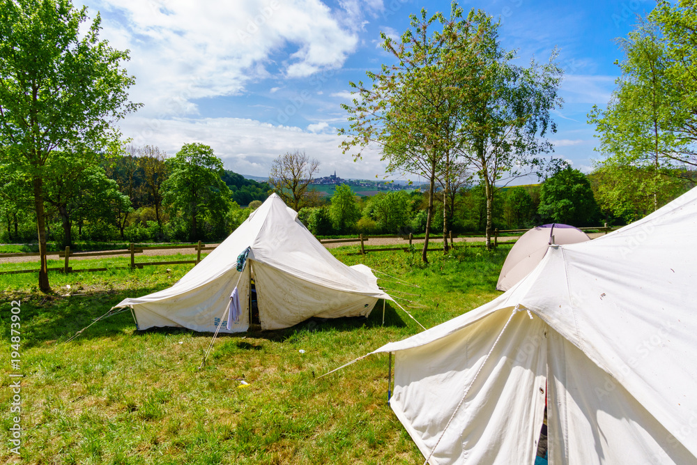 white tents in a scout camp