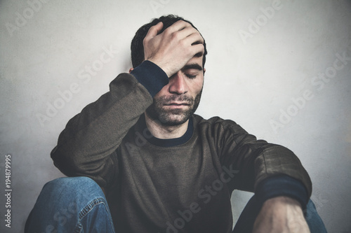 Caucasian depressed man. photo