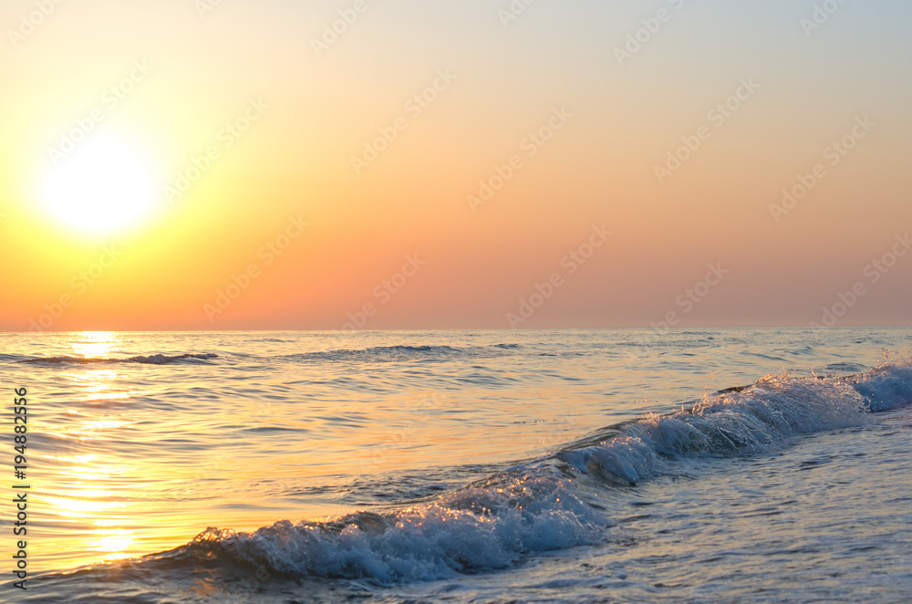 sunrise over the sea horizon, waves, splashes
