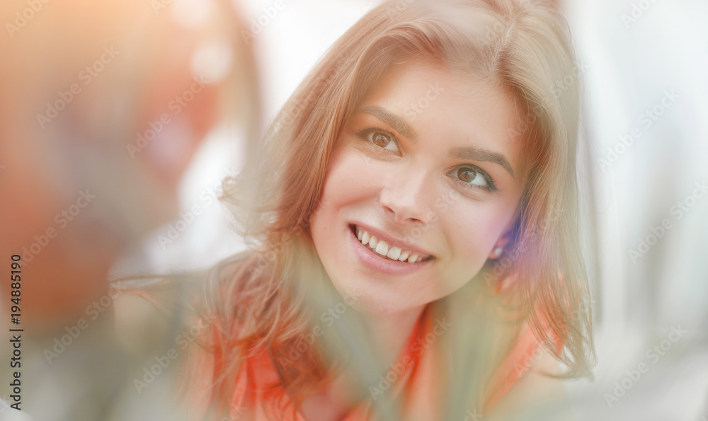 portrait of smiling woman face on blurred background. portrait of smiling woman face on blurred background.