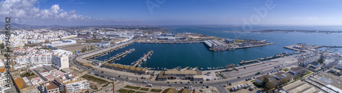 Aerial daytime view of Olhao fishing dock and seascape, waterfront to Ria Formosa natural park. Algarve. © Carlos Neto