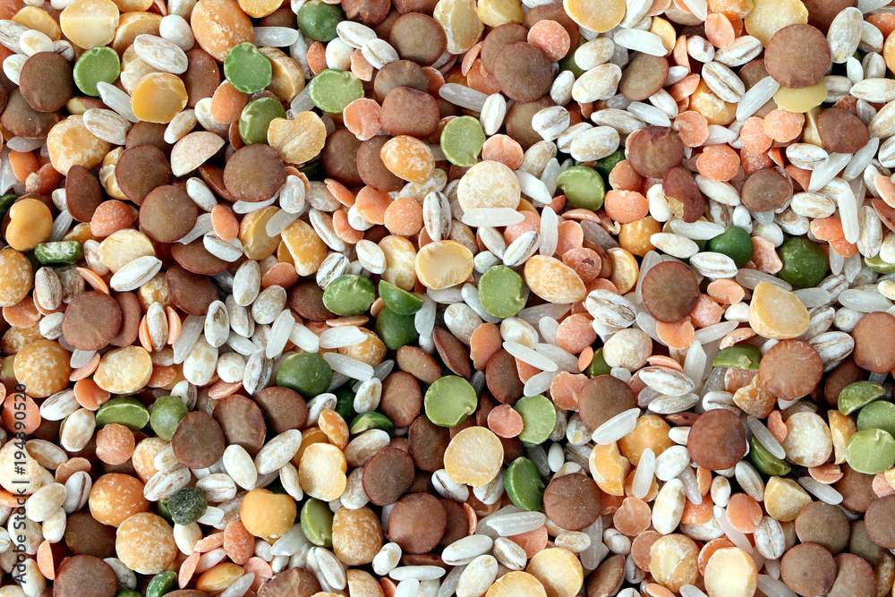 Grain background. Mixture of soup from legumes and cereals: chopped peas, lentils, grinded rice, pearl barley. Healthy food. Grain background. Mixture of soup from legumes and cereals: chopped peas, lentils, grinded rice, pearl barley. Healthy food.