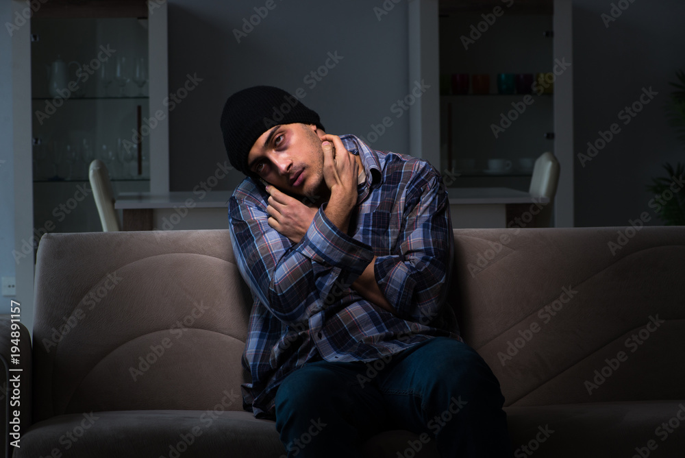 Young man in agony having problems with narcotics 