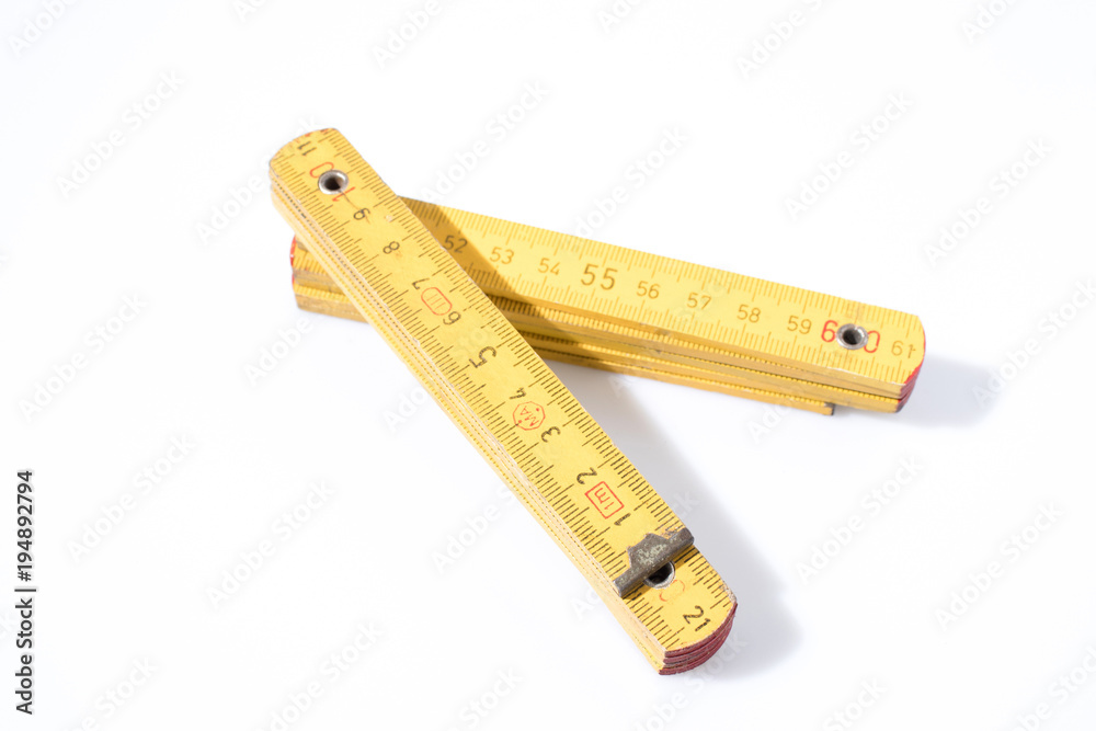 Yellow meter in a white backgorund composition Yellow meter in a white backgorund composition