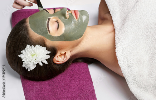 Face peeling mask, spa beauty treatment, skincare. Woman getting