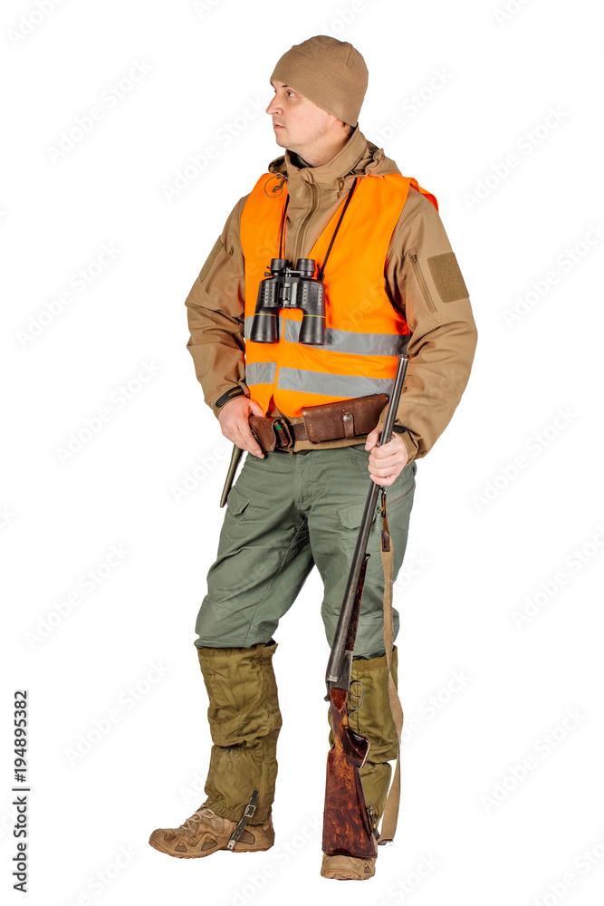 Full length portrait of a male hunter with double barreled shotgun Isolated on white background. hunting and people concept. Full length portrait of a male hunter with double barreled shotgun Isolated on white background. hunting and people concept.