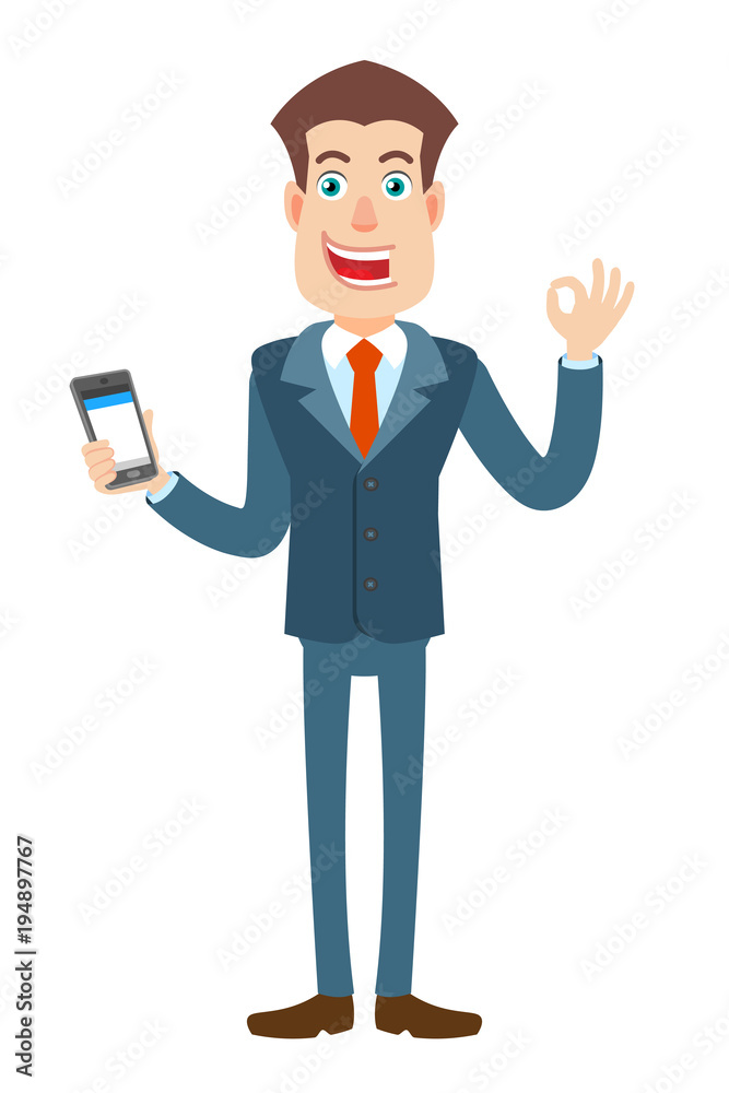Businessman holding mobile phone and showing a okay hand sign Businessman holding mobile phone and showing a okay hand sign