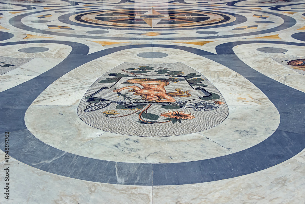 mosaic on floor at Galleria Umberto I in Naples, Italy