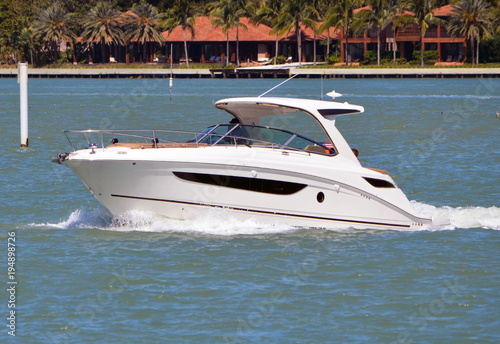 Cabin cruiser on the florida intra-coastal waterway off Miami Beach.
