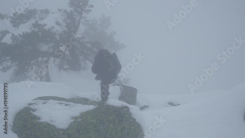 Woman getting up and entering the fog