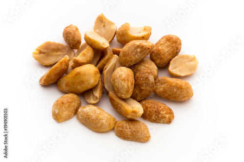 Peeled peanuts on the isolated background.