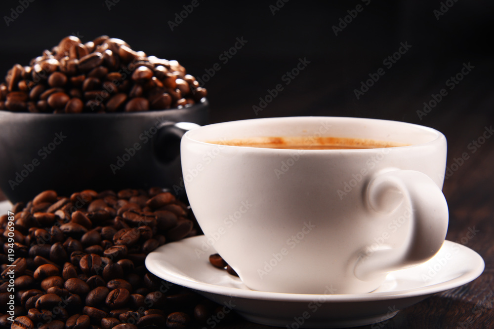 Composition with two cups of coffee and beans Composition with two cups of coffee and beans