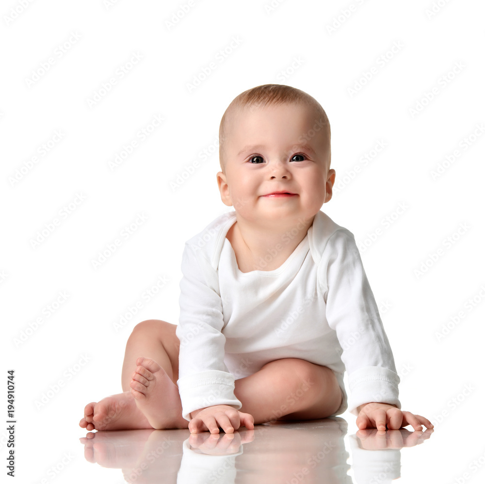 7 month infant child baby girl toddler sitting in white shirt isolated 7 month infant child baby girl toddler sitting in white shirt isolated