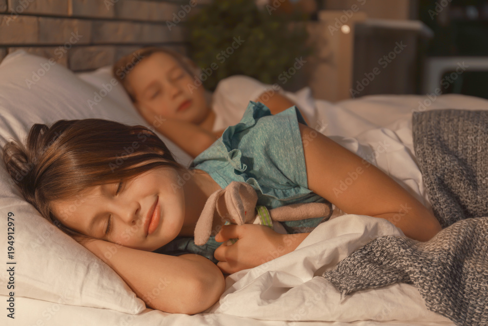 Sleeping Sister Brother Xxx - Cute little sister and brother sleeping in bed at home Stock Photo | Adobe  Stock