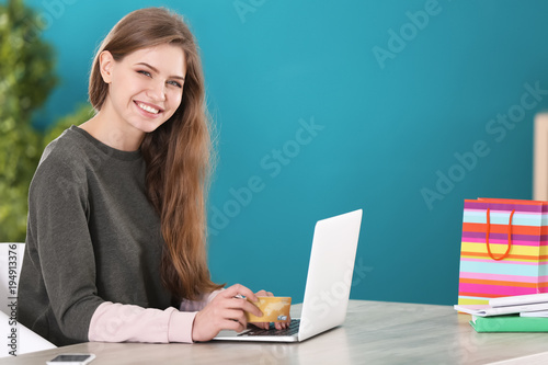 Young woman shopping online...
