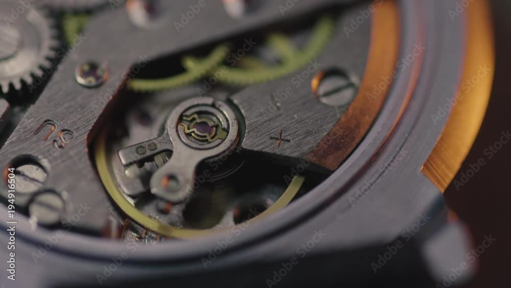 Macro shoot of working analog watch mechanism Macro shoot of working analog watch mechanism