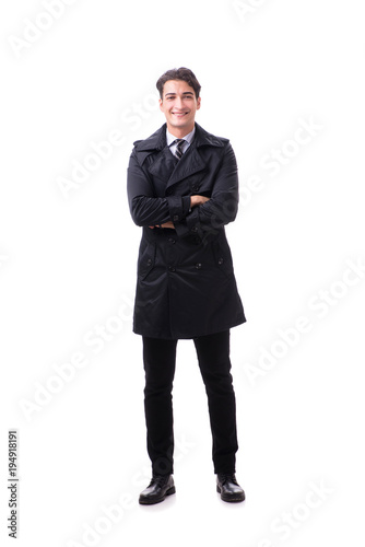 Young businessman wearing winter coat isolated on white