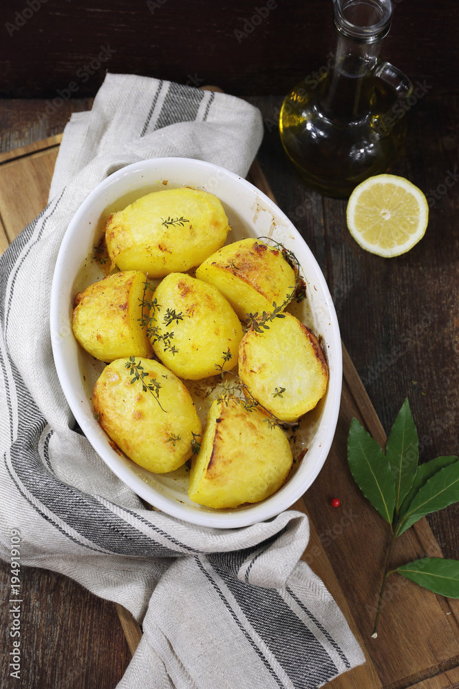 Fried potatoes, bay leaf and olive oil, rustic style Fried potatoes, bay leaf and olive oil, rustic style