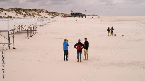 Aeolian beach experiment marine students hydrography measuring sand transport theodolite PERSPECTIVE TOWARDS sea photo