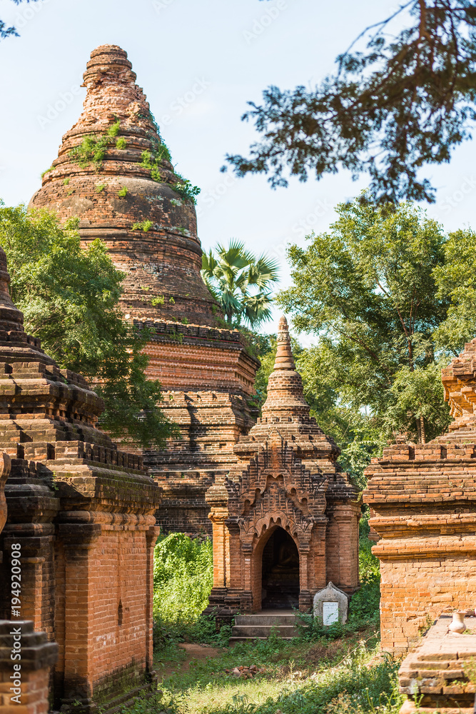 View of the complex of ancient pagodas in Bagan, Myanmar. Copy space for text. Vertical.