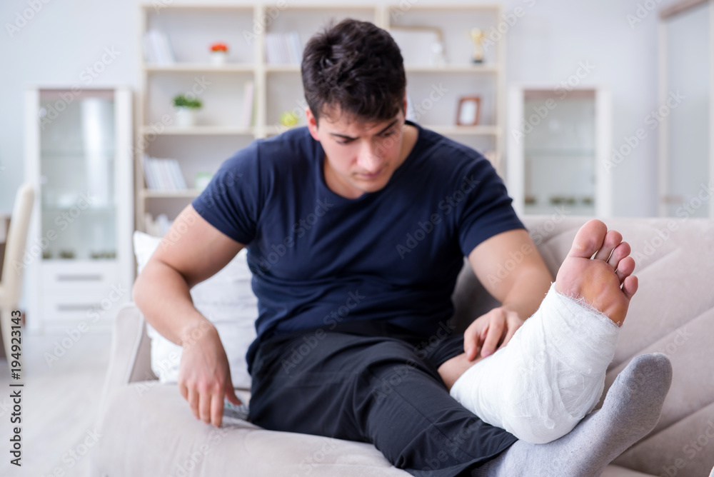 Man with broken leg recovering at home Man with broken leg recovering at home