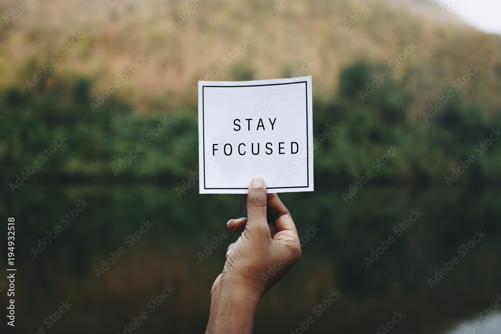 Stay focused text in nature inspirational motivation and advice concept - obrazy, fototapety, plakaty 