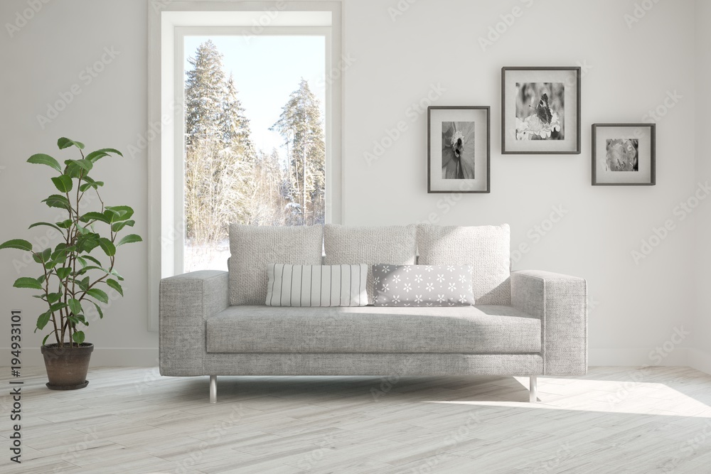Fototapeta premium White room with sofa and winter landscape in window. Scandinavian interior design. 3D illustration