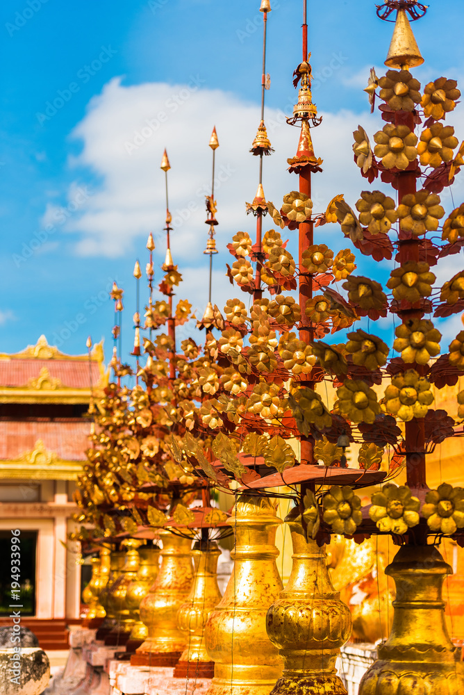 Fototapeta premium View of the pagoda sculpture of the Shwezigon in Bagan, Myanmar. Copy space for text. Vertical.