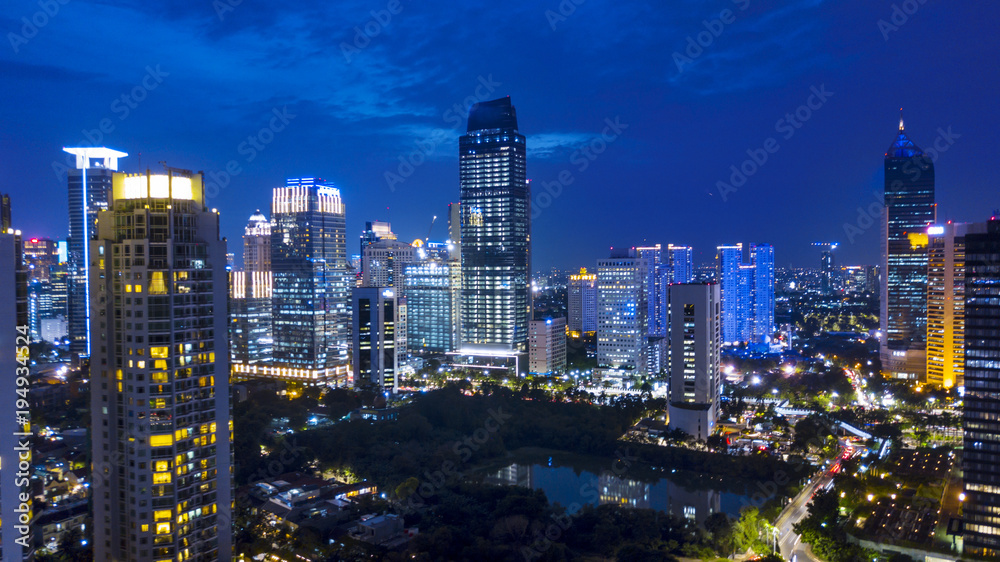 Aerial night view of Jakarta cityscapes near Kuningan Central Business District.