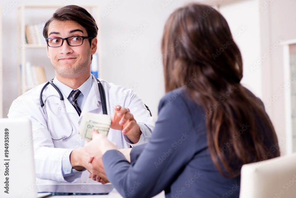 Doctor in corruption concept with being offered bribe Doctor in corruption concept with being offered bribe