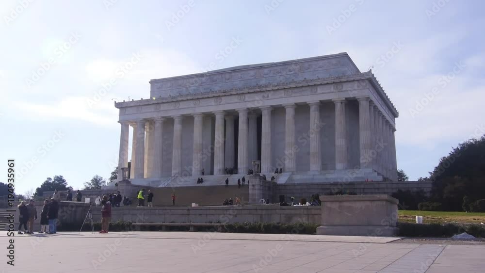 Monument From Outside Near People - Pan - Right To Left Monument From Outside Near People - Pan - Right To Left