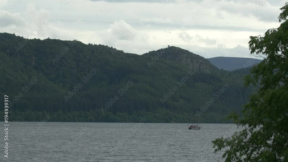 Scenery with a sailing boat Scenery with a sailing boat
