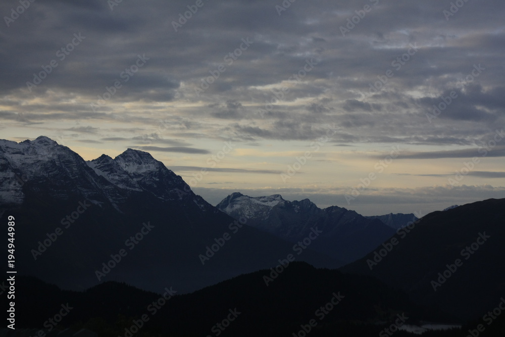 snowcapped mountains seen from a mountain road in Switzerland, Europe