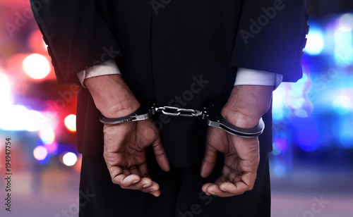 Obraz na płótnie Businessman in handcuffs
