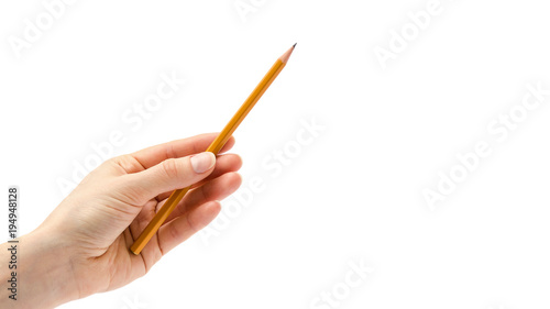 hand of girl holding pencil. Isolated on white background. copy space, template.