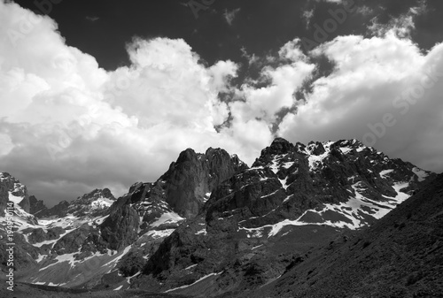 Black and white mountains and sky with clouds in nice day