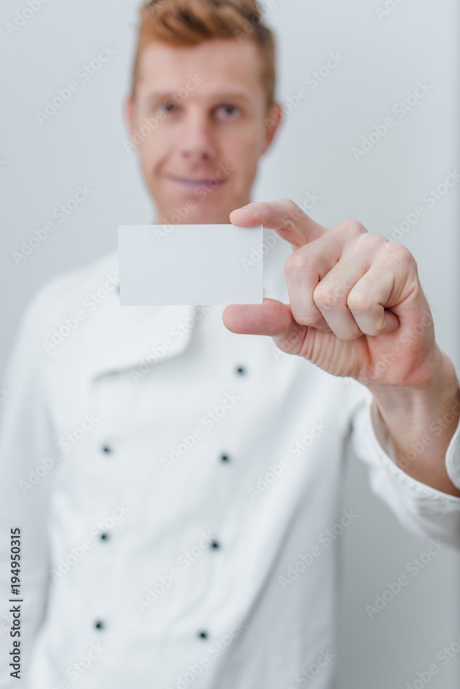 Male chef on white background