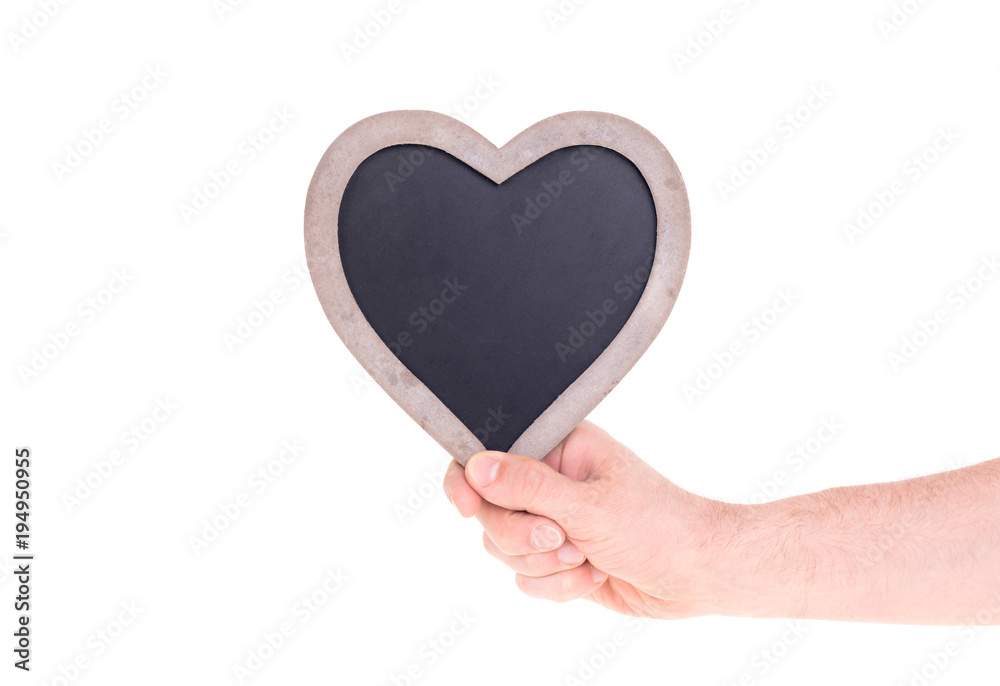 Adult holding heart shaped chalkboard Adult holding heart shaped chalkboard