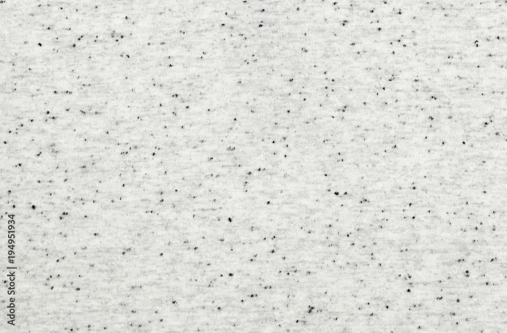 Obraz premium Real white-grey with black knitted fabric made of synthetic fibres textured background. Recycling of old things.