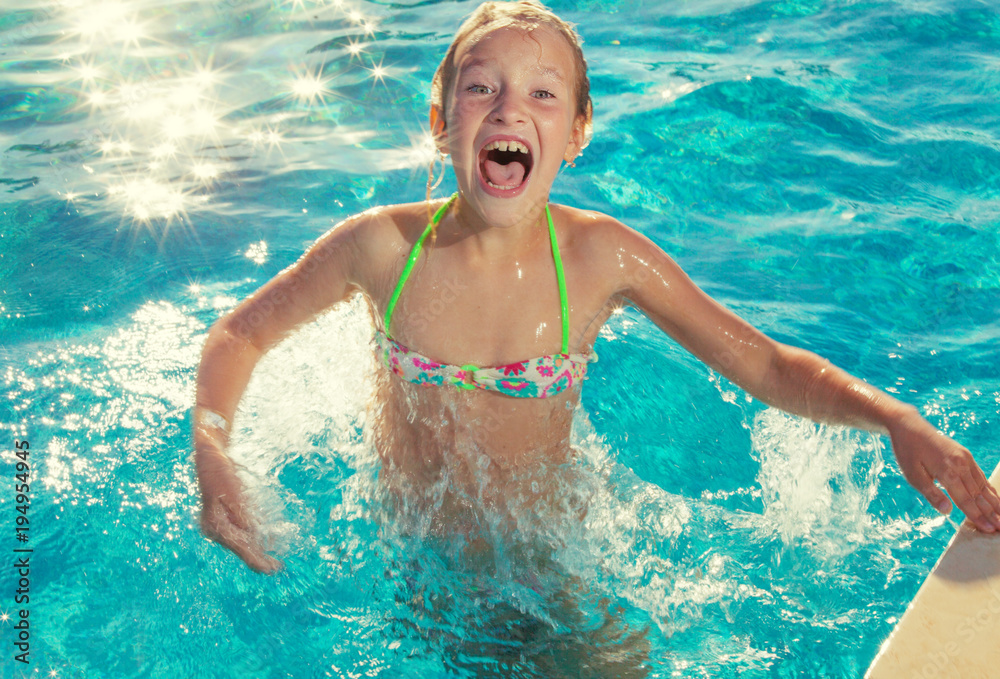 Happy child at pool