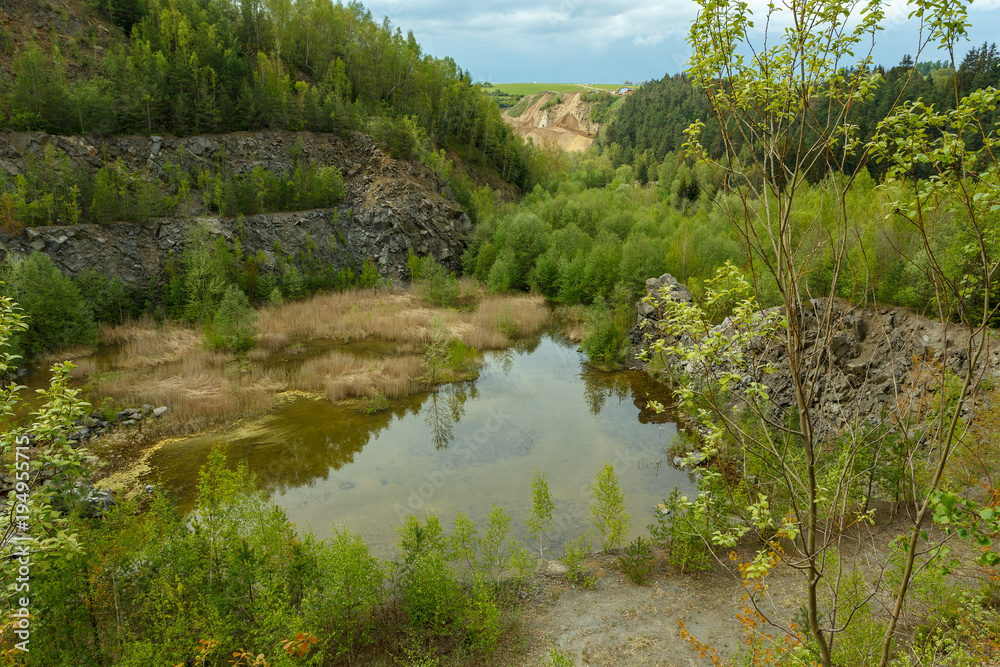 abandoned flooded quarry, Czech republic abandoned flooded quarry, Czech republic