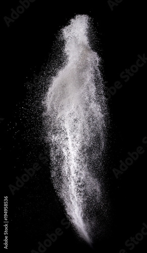 Washing powder explosion isolated on over dark background,Motion blur
