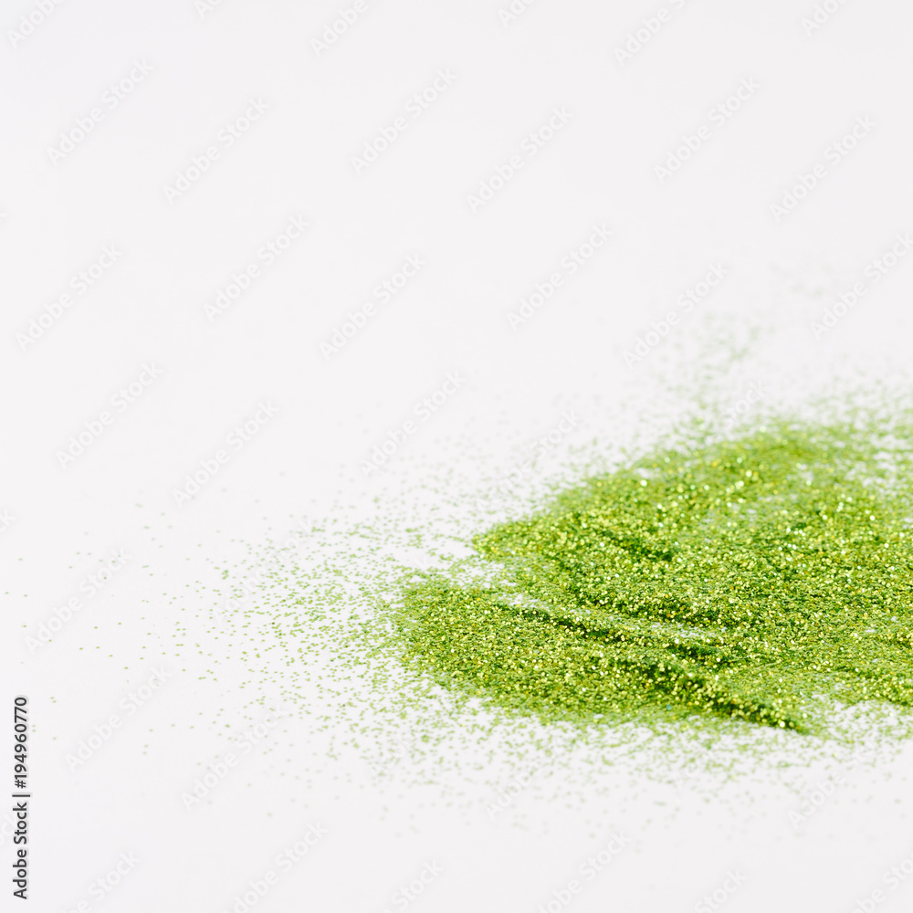 Green sparkles on a white background Green sparkles on a white background