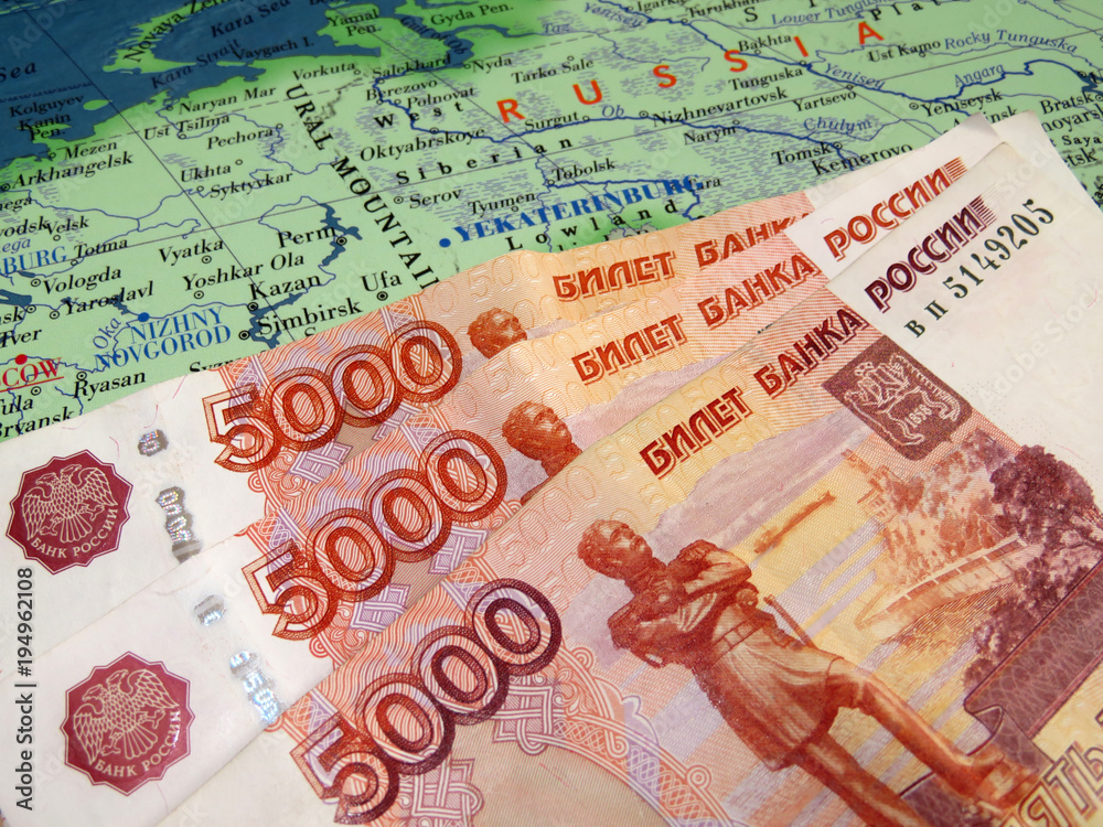 Russian rubles on the map of Russia. The Russian economy