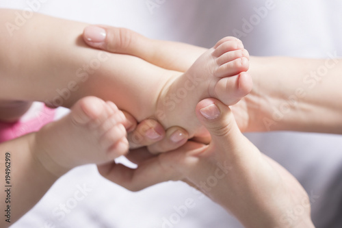 baby feet exercise. selective focus © arizanko