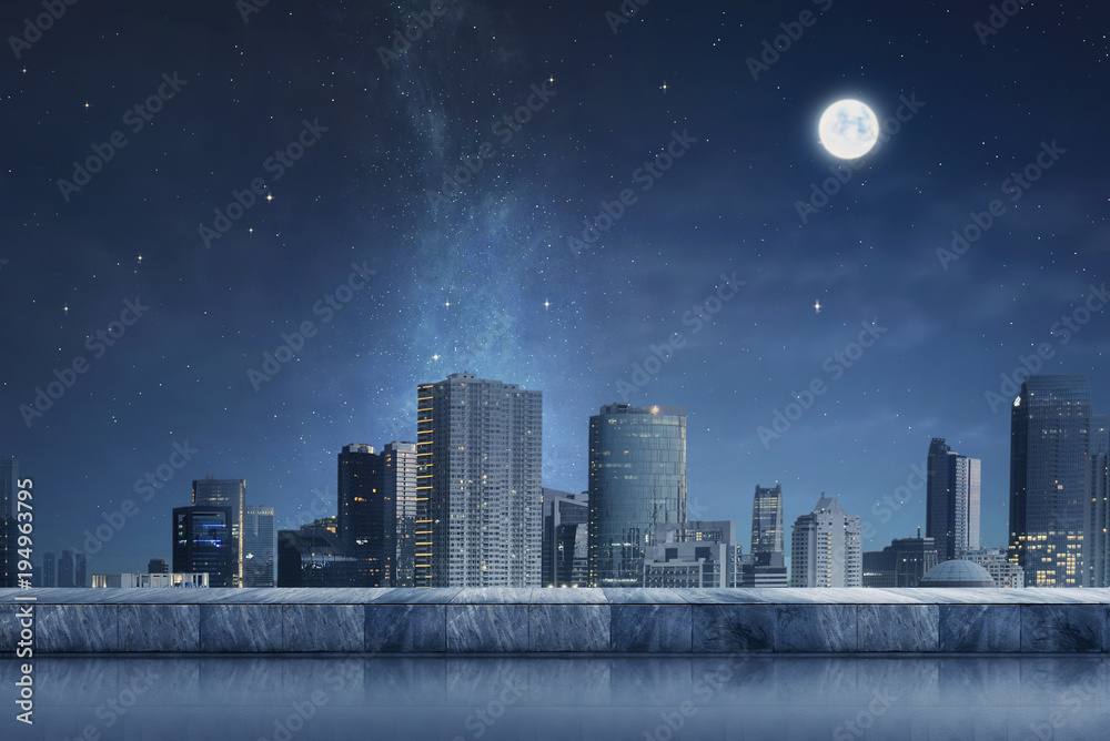 Cityscape with night scene and moonlight